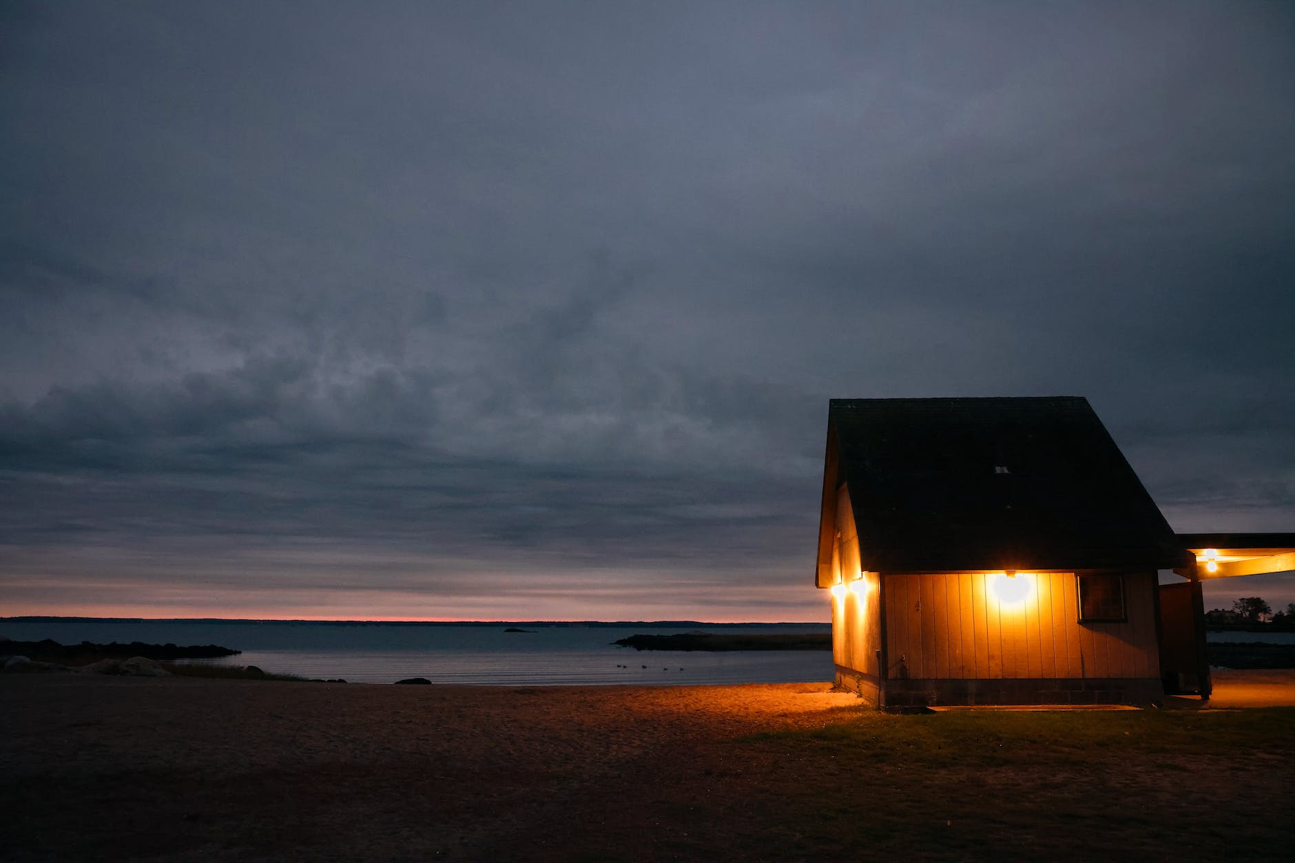 light in a hut on a beach