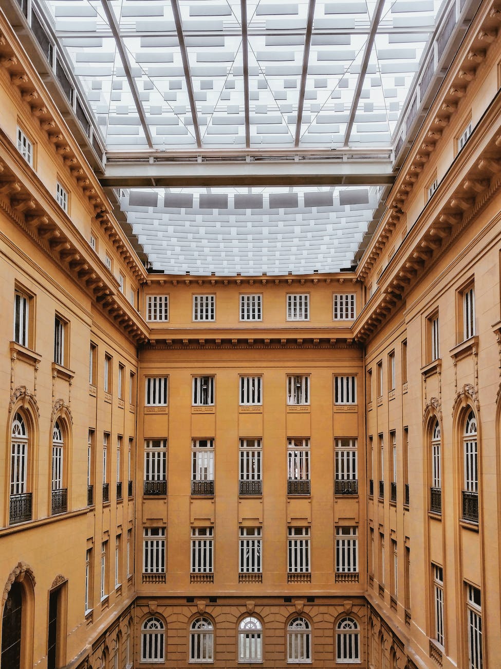 huge building yard with glass ceiling in daytime