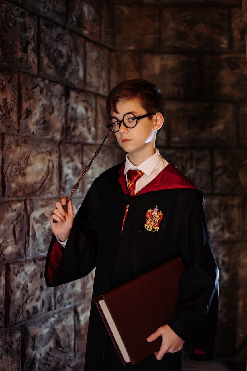 a boy wearing a harry potter costume